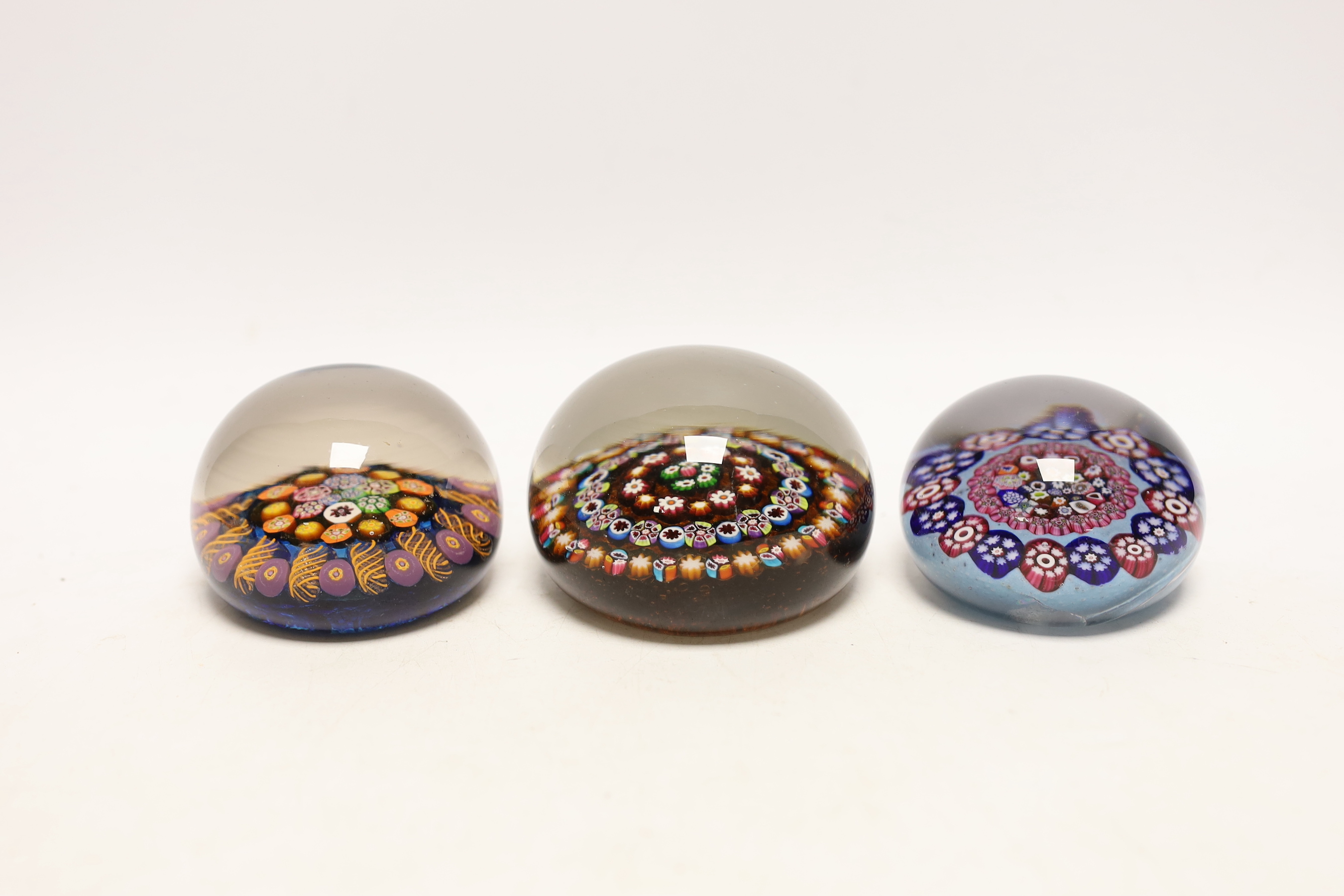 Three paperweights: one Perthshire and two others, Perthshire 6cm high